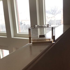Clear and gold purse